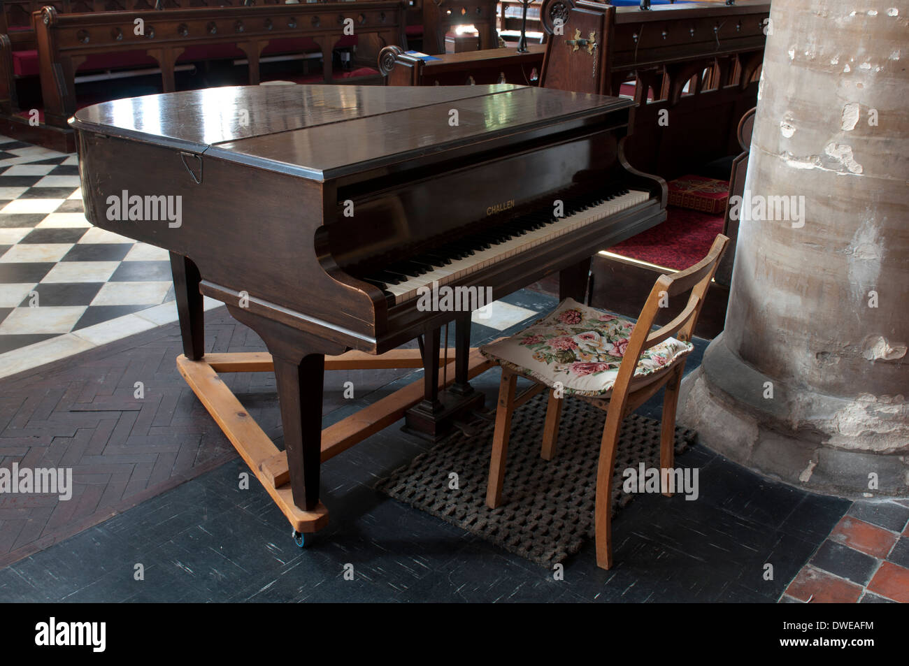A piano in St. Stephen`s Church, Redditch, Worcestershire, UK Stock Photo